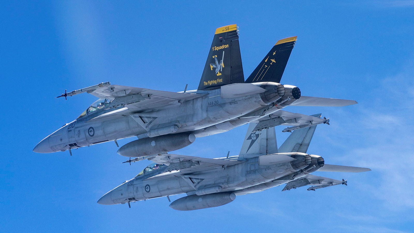 Royal Australian Air Force aircraft flying in formation.